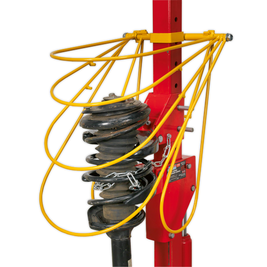 Restraint System for Coil Spring Compressors